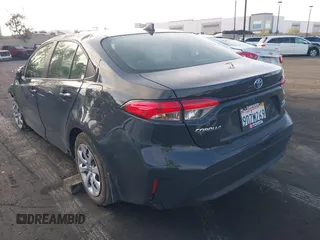 2023 Toyota Corolla Hybrid LE with VIN JTDBCMFE4P3002191, listed as a IAAI auction lot 41957008 with 80,891 mi miles and . Bid and sale history available at carsss.com. Image 3.