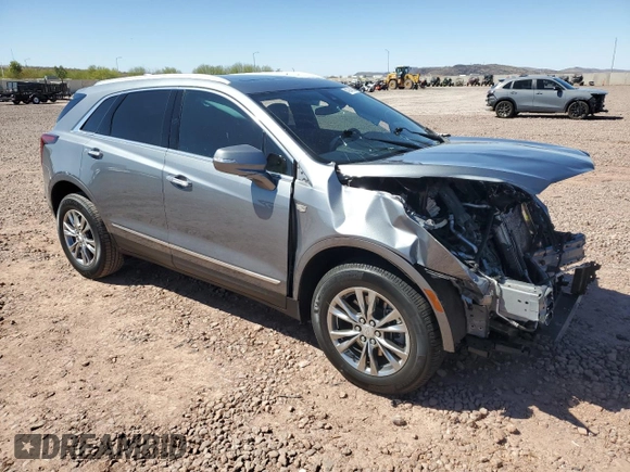 2021 Cadillac XT5 FWD Premium Luxury with VIN 1GYKNCRS9MZ186536, listed as a Copart auction lot 49745915 with 28,321 mi miles and Salvage Title. Bid and sale history available at carsss.com. Image 4.