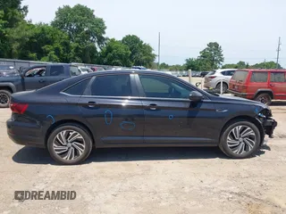 2020 Volkswagen Jetta SEL z VIN 3VWEB7BU2LM052964, wystawiony jako IAAI lot #42316780 z przebiegiem 79 929 mil mil oraz . Historia ofert i sprzedaży dostępna na DreamBid. Obrazek 14.