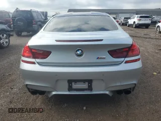 2014 BMW M6 z VIN WBSLX9C53ED160340, wystawiony jako Copart lot #68315924 z przebiegiem 95 899 mil mil oraz Czysty tytuł • Clean title. Historia ofert i sprzedaży dostępna na DreamBid. Obrazek 6.