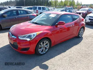 2016 Hyundai Veloster with VIN KMHTC6AD2GU284741, listed as a IAAI auction lot 42108919 with 162,616 mi miles. Bid and sale history available at carsss.com. Image 2.