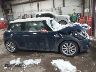2018 MINI Hardtop Cooper S with VIN WMWXP7C53J2A47152, listed as a IAAI auction lot 41595622 with 66,359 mi miles and . Bid and sale history available at DreamBid. Image 13.