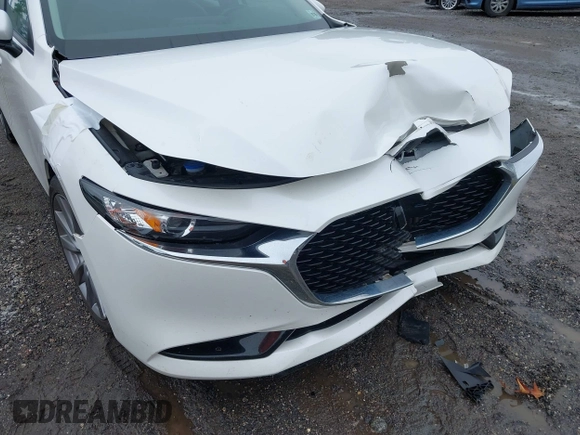 2021 Mazda 3 Preferred z VIN 3MZBPBCL0MM250862, wystawiony jako IAAI lot #42318612 z przebiegiem 86 056 mil mil oraz . Historia ofert i sprzedaży dostępna na DreamBid. Obrazek 18.