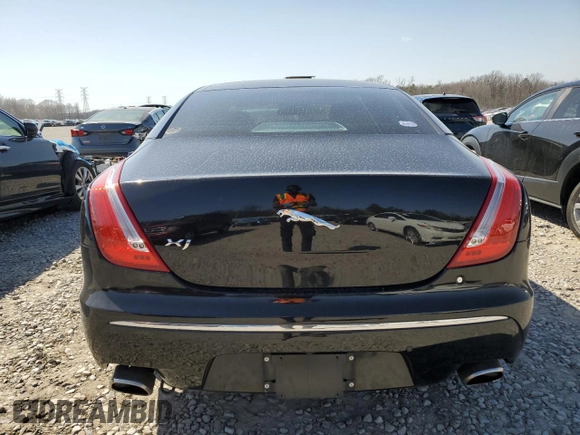 2012 Jaguar XJ with VIN SAJWA1CB5CLV29023, listed as a Copart auction lot 48300165 with 42,725 mi miles and Salvage title. Bid and sale history available at DreamBid. Image 6.