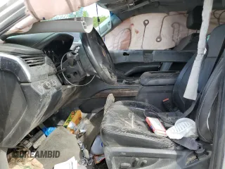 2016 Chevrolet Suburban LT z VIN 1GNSKHKC4GR285212, wystawiony jako Copart lot #58021115 z przebiegiem Nie podano mil oraz Szkoda całkowita • Salvage title. Historia ofert i sprzedaży dostępna na DreamBid. Obrazek 7.