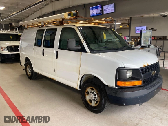 2015 Chevrolet Express Cargo with VIN 1GCWGFCG0F1145334, listed as a IAAI auction lot 42610461 with 143,162 mi miles and . Bid and sale history available at DreamBid. Image 31.
