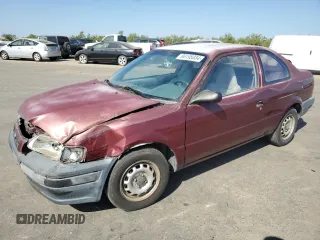1996 Toyota Tercel DX z VIN JT2AC52L8T0124403, wystawiony jako Copart lot #66195834 z przebiegiem 137 467 mil mil oraz Szkody całkowita. Historia ofert i sprzedaży dostępna na DreamBid. Obrazek 1.