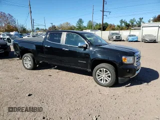 2016 GMC Canyon 4WD SLT with VIN 1GTP6DE11G1357147, listed as a Copart auction lot 77835344 with 106,890 mi miles and Salvage Title. Bid and sale history available at carsss.com. Image 11.