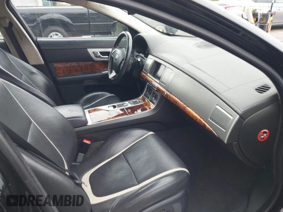 2015 Jaguar XF V6 Portfolio with VIN SAJWA0F77F8U65737, listed as a IAAI auction lot 42078529 with 62,229 mi miles. Bid and sale history available at carsss.com. Image 5.