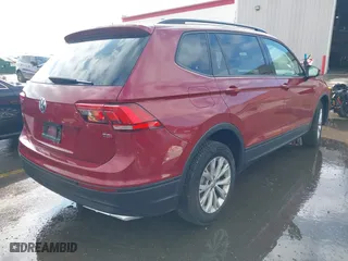 2018 Volkswagen Tiguan S with VIN 3VV1B7AX0JM043255, listed as a IAAI auction lot 41641512 with 79,069 mi miles. Bid and sale history available at carsss.com. Image 4.