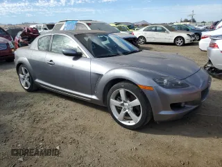 2004 Mazda RX-8 with VIN JM1FE17N240117619, listed as a Copart auction lot 77235454 with 121,887 mi miles and Clean Title. Bid and sale history available at carsss.com. Image 4.