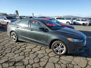2015 Ford Fusion SE Hybrid with VIN 3FA6P0LU4FR213570, listed as a Copart auction lot 82136224 with 148,524 mi miles and Salvage Title. Bid and sale history available at carsss.com. Image 4.