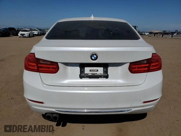 2013 BMW 3 Series 328i xDrive with VIN WBA3B3C51DF532714, listed as a Copart auction lot 57854735 with 140,650 mi miles and Salvage title. Bid and sale history available at DreamBid. Image 6.