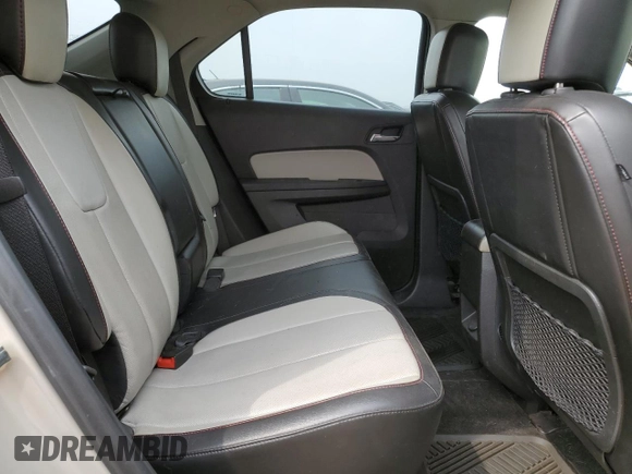 2012 Chevrolet Equinox LTZ z VIN 2GNFLGEK7C6185557, wystawiony jako Copart lot #60963655 z przebiegiem 162 795 mil mil oraz Czysty tytuł • Clean title. Historia ofert i sprzedaży dostępna na DreamBid. Obrazek 10.