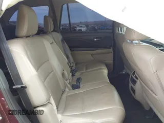 2016 Honda Pilot EX-L with VIN 5FNYF5H57GB028307, listed as a IAAI auction lot 41925711 with 125,118 mi miles and . Bid and sale history available at DreamBid. Image 8.