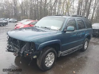 2005 Chevrolet Tahoe LT with VIN 1GNEK13T75R253693, listed as a IAAI auction lot 42013420 with 152,952 mi miles. Bid and sale history available at carsss.com. Image 2.