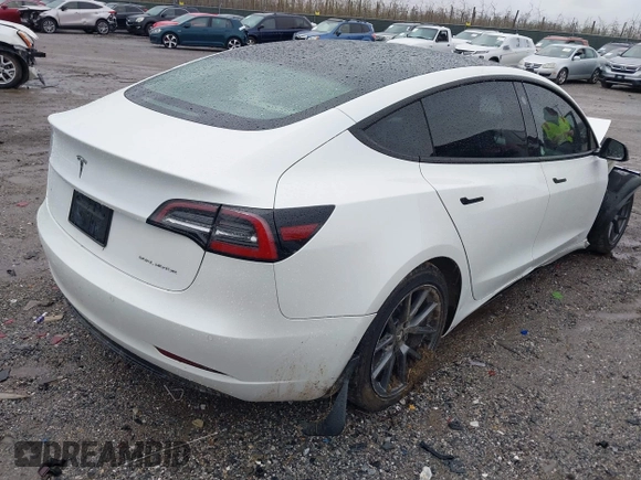 2022 Tesla Model 3 Long Range with VIN 5YJ3E1EB0NF129945, listed as a IAAI auction lot 41965531 with 59,162 mi miles and . Bid and sale history available at DreamBid. Image 4.