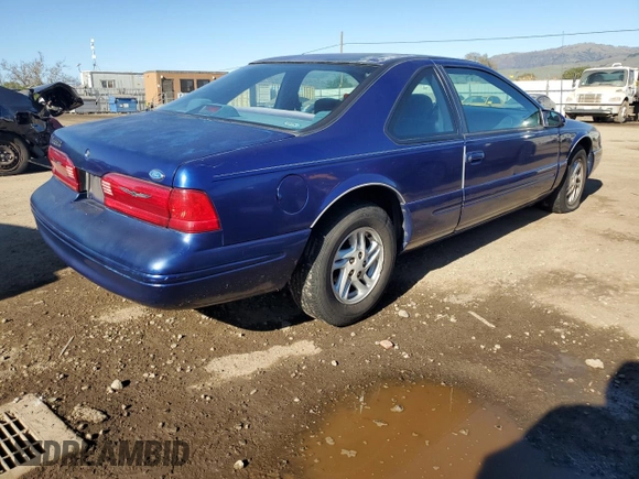 1997 Ford Thunderbird LX with VIN 1FALP6247VH129234, listed as a Copart auction lot 47096335 with 101,461 mi miles and Clean Title. Bid and sale history available at DreamBid. Image 3.