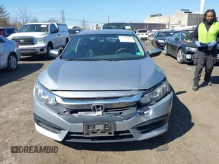 2016 Honda Civic LX with VIN 19XFC2F5XGE230467, listed as a IAAI auction lot 41768980 with 145,592 mi miles. Bid and sale history available at carsss.com. Image 12.