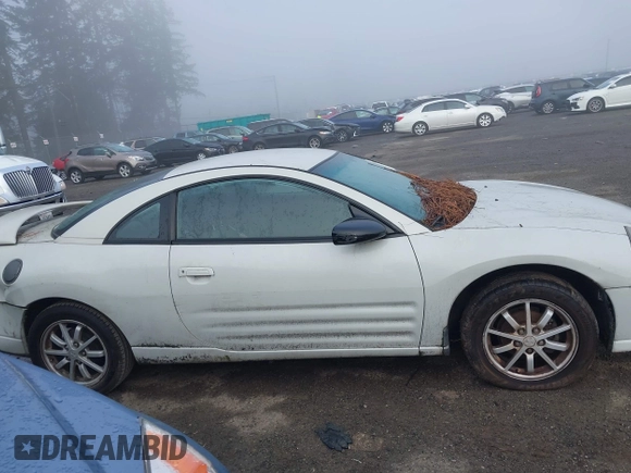 2001 Mitsubishi Eclipse GS with VIN 4A3AC44G21E214287, listed as a IAAI auction lot 41004057 with 99,465 mi miles and . Bid and sale history available at carsss.com. Image 13.