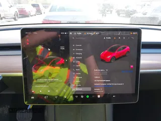2024 Tesla Model Y Long Range with VIN 7SAYGDEE9RF199805, listed as a IAAI auction lot 42018221 with 7,359 mi miles. Bid and sale history available at carsss.com. Image 19.