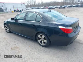 2007 BMW 5 Series 530i with VIN WBANE73597CM56897, listed as a IAAI auction lot 42113113 with 212,774 mi miles. Bid and sale history available at carsss.com. Image 3.