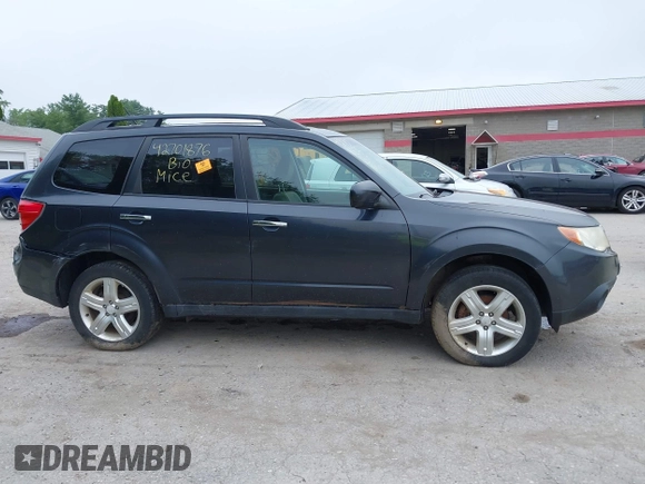 2009 Subaru Forester X with VIN JF2SH63679H701039, listed as a IAAI auction lot 42701876 with 127,401 mi miles and . Bid and sale history available at DreamBid. Image 14.