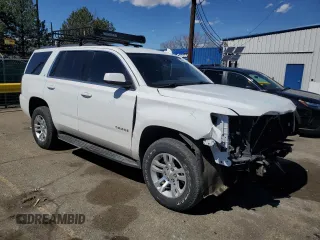 2019 Chevrolet Tahoe LT with VIN 1GNSKBKC5KR137818, listed as a Copart auction lot 50654885 with 138,334 mi miles and Salvage title. Bid and sale history available at DreamBid. Image 4.