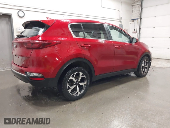 2020 Kia Sportage LX with VIN KNDPMCAC7L7809195, listed as a IAAI auction lot 41976306 with 59,648 mi miles. Bid and sale history available at carsss.com. Image 4.