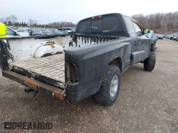 1999 Dodge Dakota SLT with VIN 1B7GG22Y6XS231301, listed as a IAAI auction lot 41427598 with Not Provided miles and . Bid and sale history available at carsss.com. Image 4.