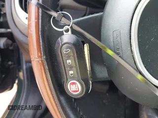 2014 FIAT 500L Trekking z VIN ZFBCFADH1EZ029143, wystawiony jako IAAI lot #42360677 z przebiegiem Nie podano mil oraz . Historia ofert i sprzedaży dostępna na DreamBid. Obrazek 11.