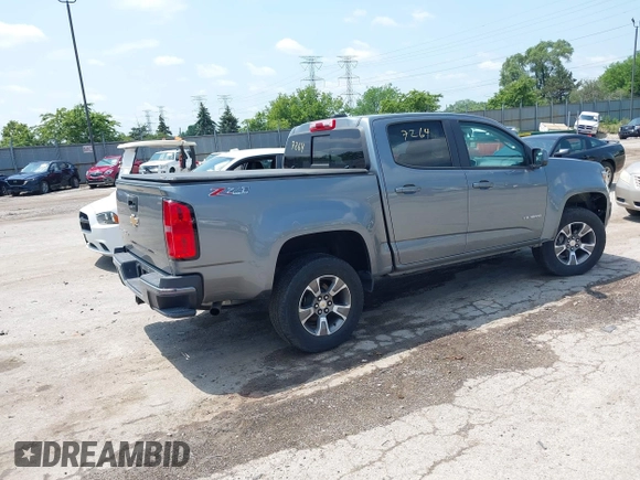 2018 Chevrolet Colorado 4WD Z71 with VIN 1GCGTDENXJ1247717, listed as a IAAI auction lot 42557264 with 91,463 mi miles and . Bid and sale history available at DreamBid. Image 4.