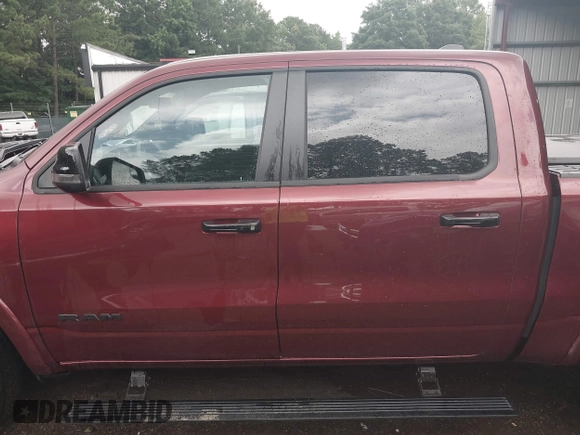 2023 Ram 1500 Limited with VIN 1C6SRFHM2PN509939, listed as a IAAI auction lot 42514018 with 31,669 mi miles and . Bid and sale history available at DreamBid. Image 14.