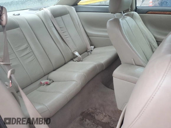 2002 Toyota Solara SE z VIN 2T1CF22P82C547530, wystawiony jako Copart lot #58586165 z przebiegiem 209 267 mil mil oraz Szkoda całkowita • Salvage title. Historia ofert i sprzedaży dostępna na DreamBid. Obrazek 10.