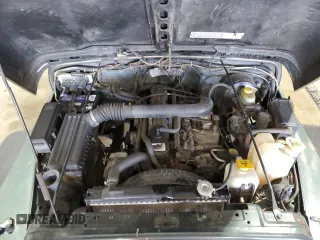 2002 Jeep Wrangler X with VIN 1J4FA39SX2P718415, listed as a Copart auction lot 52788015 with 152,093 mi miles and Salvage Title. Bid and sale history available at carsss.com. Image 11.