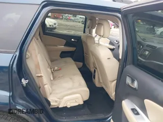 2014 Dodge Journey SXT z VIN 3C4PDCBG8ET126938, wystawiony jako IAAI lot #42526536 z przebiegiem 142 664 mil mil oraz . Historia ofert i sprzedaży dostępna na DreamBid. Obrazek 8.
