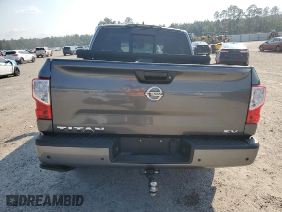 2022 Nissan Titan SV with VIN 1N6AA1EF6NN102544, listed as a Copart auction lot 74983344 with 34,090 mi miles and Salvage title. Bid and sale history available at DreamBid. Image 6.