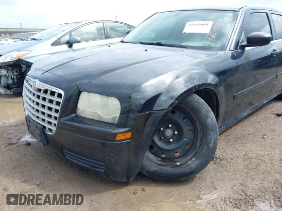 2005 Chrysler 300 300 with VIN 2C3JA43R85H574484, listed as a IAAI auction lot 42049881 with 174,662 mi miles and . Bid and sale history available at DreamBid. Image 6.