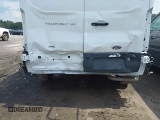 2024 Ford Transit z VIN 1FTYE2Y87RKA82840, wystawiony jako IAAI lot #42644818 z przebiegiem 10 940 mil mil oraz . Historia ofert i sprzedaży dostępna na DreamBid. Obrazek 6.