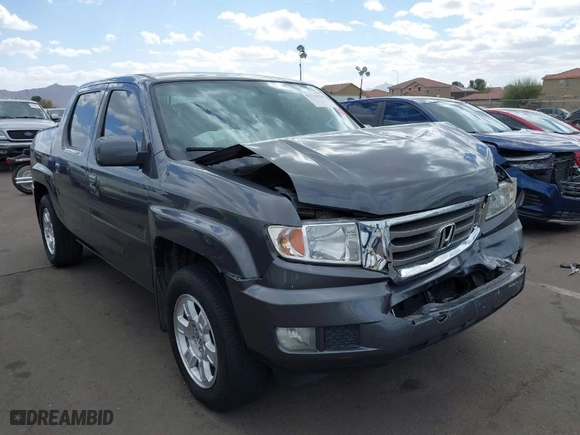 2013 Honda Ridgeline RTS with VIN 5FPYK1F4XDB016430, listed as a IAAI auction lot 41711524 with 132,185 mi miles. Bid and sale history available at carsss.com. Image 1.