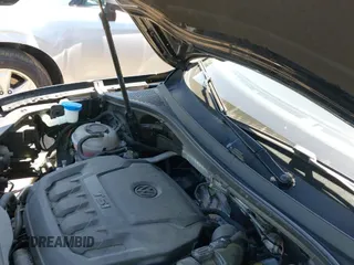 2018 Volkswagen Tiguan S с VIN 3VV0B7AX8JM125228, выставлен на аукционе IAAI как лот 42562804 с пробегом 65 494 миль миль и . История ставок и продаж доступна на DreamBid. Изображение 19.