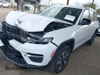 2023 Jeep Grand Cherokee with VIN 1C4RJYB60PC650900, listed as a IAAI auction lot 41773825 with 19,243 mi miles and . Bid and sale history available at DreamBid. Image 2.