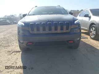2014 Jeep Cherokee Trailhawk with VIN 1C4PJMBS6EW278987, listed as a IAAI auction lot 41789868 with 136,696 mi miles. Bid and sale history available at carsss.com. Image 6.
