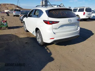 2024 Mazda CX-5 2.5 S Preferred Package with VIN JM3KFBCL5R0516853, listed as a IAAI auction lot 40859077 with 397 mi miles. Bid and sale history available at carsss.com. Image 3.