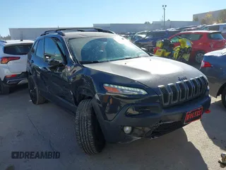 2017 Jeep Cherokee Trailhawk L Plus with VIN 1C4PJMBBXHW634944, listed as a IAAI auction lot 41022673 with 116,542 mi miles. Bid and sale history available at carsss.com. Image 1.