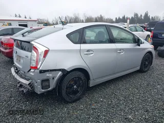 2013 Toyota Prius One with VIN JTDKN3DU4D5632615, listed as a IAAI auction lot 41891185 with 93,945 mi miles. Bid and sale history available at carsss.com. Image 4.