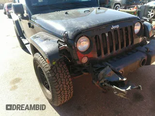 2015 Jeep Wrangler Unlimited Sahara with VIN 1C4BJWEG0FL568237, listed as a IAAI auction lot 41697726 with 82,751 mi miles. Bid and sale history available at carsss.com. Image 6.