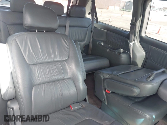 2003 Honda Odyssey EX-L with VIN 5FNRL18923B071598, listed as a IAAI auction lot 41947046 with 224,394 mi miles and . Bid and sale history available at DreamBid. Image 8.