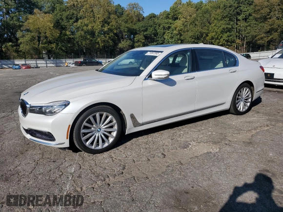 2016 BMW 7 Series 740i with VIN WBA7E2C54GG547970, listed as a Copart auction lot 71097393 with 60,464 mi miles. Bid and sale history available at carsss.com. Image 1.