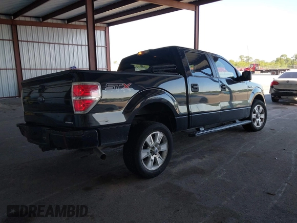 2014 Ford F-150 XL with VIN 1FTFW1CF9EKF87745, listed as a IAAI auction lot 42026883 with 221,307 mi miles. Bid and sale history available at carsss.com. Image 4.